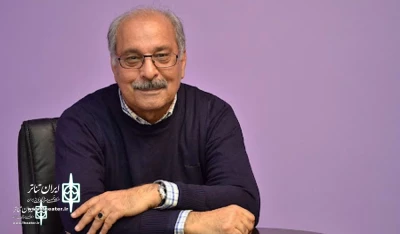 Mohammad Reza Khaki is holding a 