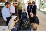 ادای احترام به شهدا و هنرمندان رخ در نقاب خاک کشیده در گلزار شهدای اهواز 7
