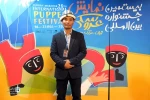 A member of  Kyrgyz Theater Group, «Er Toshtuk», on the 20th Tehran Mobarak International Puppet Festival