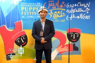 A member of  Kyrgyz Theater Group, «Er Toshtuk», on the 20th Tehran Mobarak International Puppet Festival
