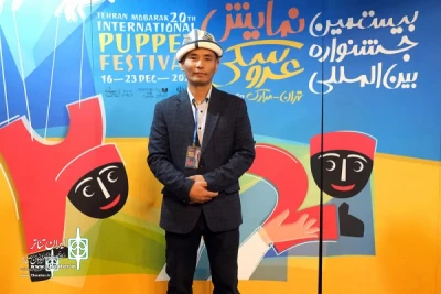 A member of  Kyrgyz Theater Group, «Er Toshtuk», on the 20th Tehran Mobarak International Puppet Festival